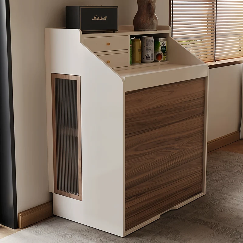 Mesa de comedor que ahorra espacio con almacenamiento oculto para sillas y cajones integrados.